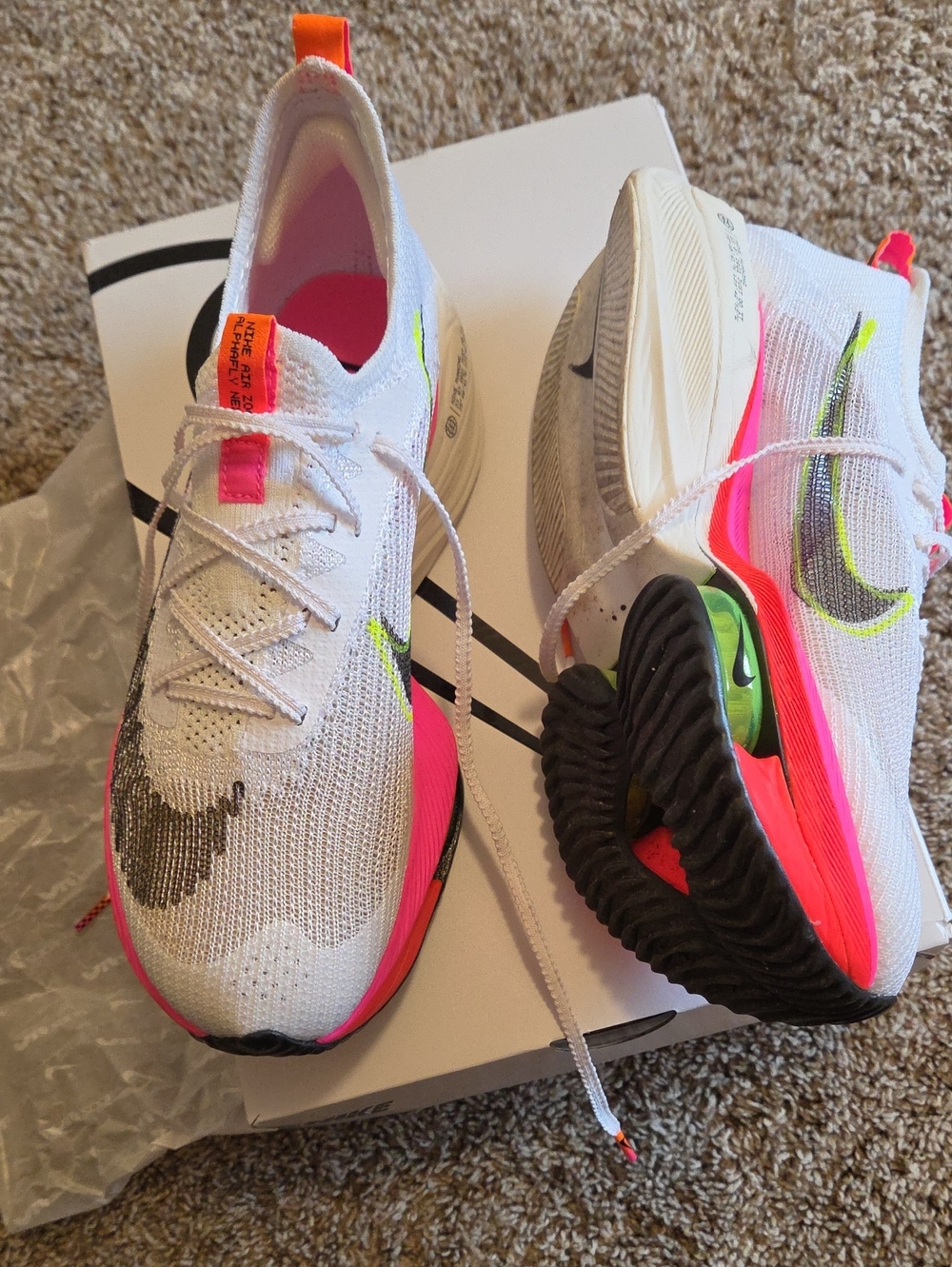 Nike White Flyknit Running Shoes with Pink & Neon Green Accents